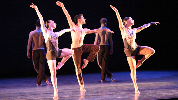 Dance group performing on stage