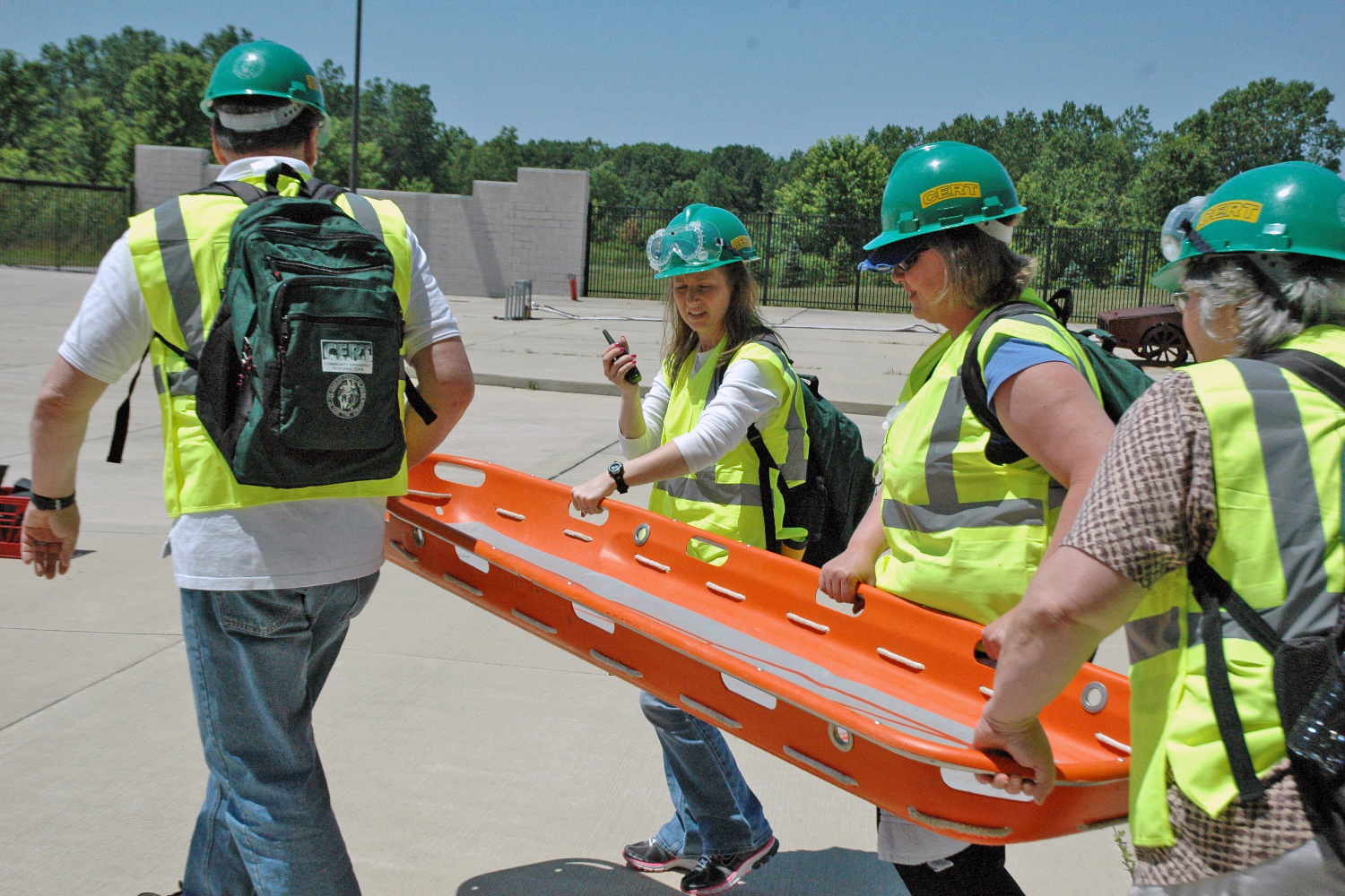 Team members working together on CERT training